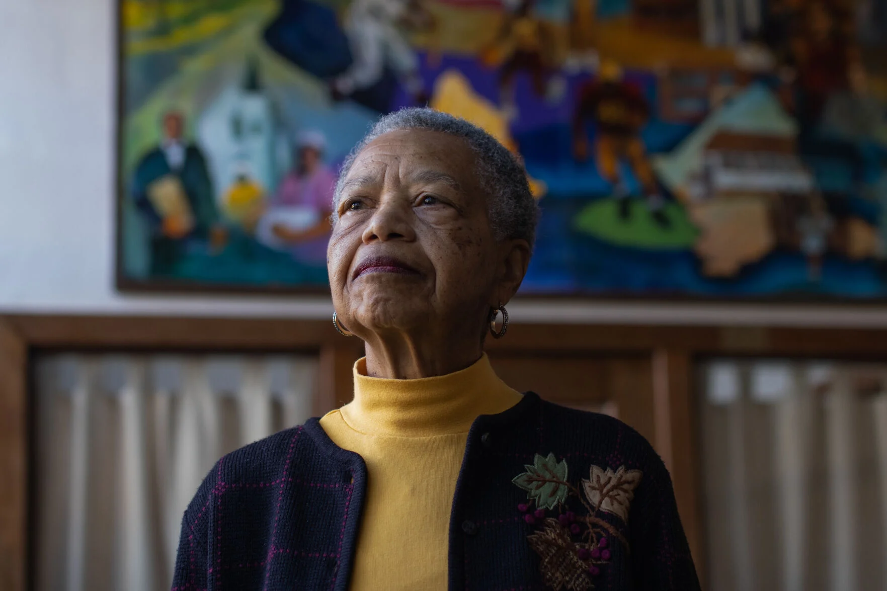 Jane Pollard standing in the Carver 4-County Museum in Culpeper, where she volunteers on weekends. Pollard attended high school in the building when it was the George Washington Carver Regional High School, the only school available to Black students in the region at the time.