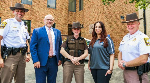Fauquier County Sheriff’s Office’s Lt. Andy Marshall, coordinator for the co-responder program; Jim LaGraffe, executive director of Rappahannock-Rapidan Community Services; Deputy Alexyn Morgan; Justine Burns, “co-responding clinician” with the FCSO, and Fauquier Sheriff Bob Mosier, outside of the sheriff’s office in Warrenton.
