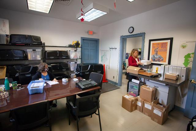 GATEKEEPER: Director of elections and general registrar Kimberly McKiernan (right) knows of no instance of voter fraud in Rappahannock.