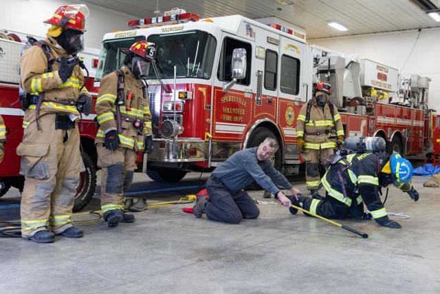 Instructor Glen Waleska demonstrates a rescue method during a training class.