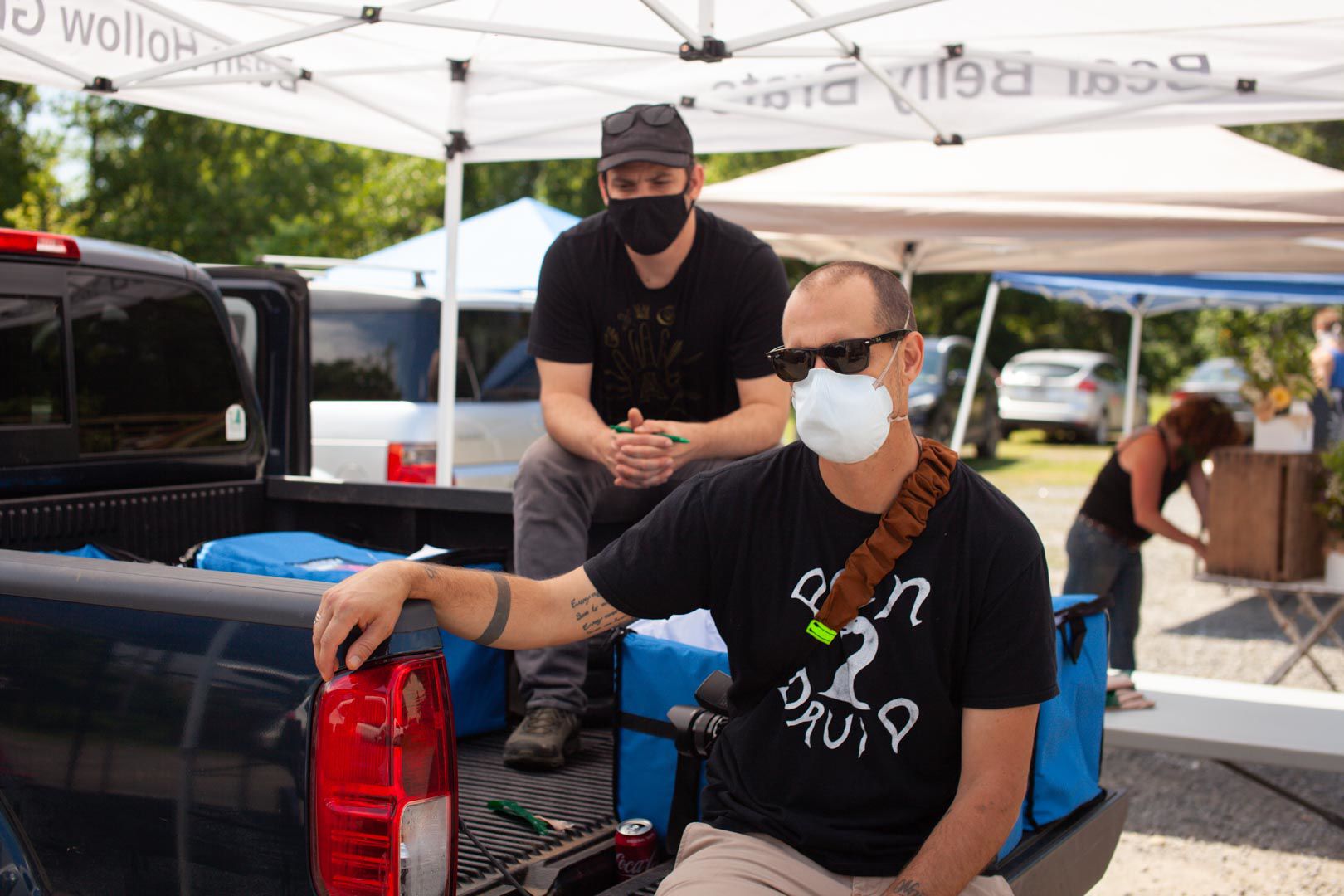 Tipo and Wil Sands work the Bean Hollow Grassfed stand at the Rappahannock Farmers’ Market.