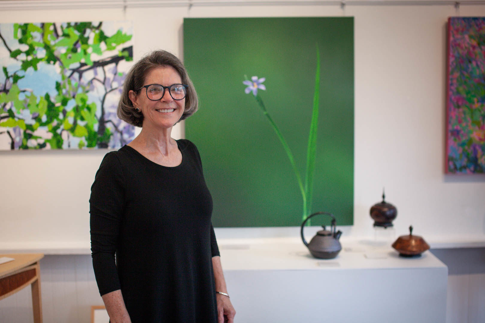Jackie Bailey Labovitz her with Blue-Eyed Grass photograph at Cottage Curator in Sperryville, Va.
