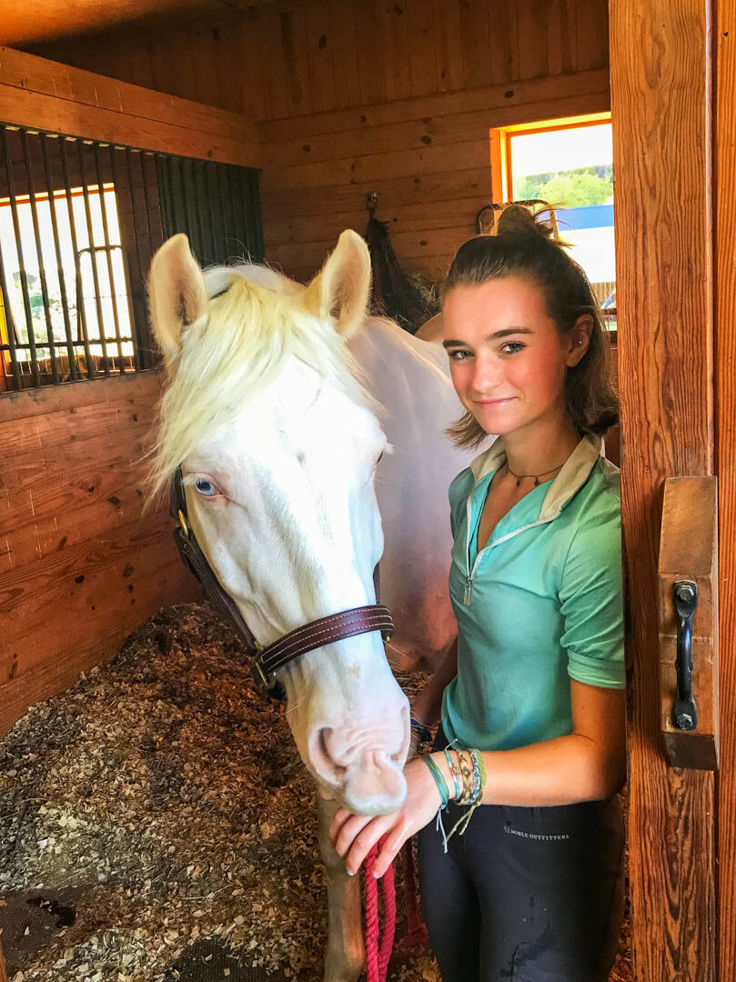 Junior rider Olivia Devening of Castleton and her striking blue eyed Cremello pony Maximus train at Sandy Hook Stables in Massies Corner, where they've caught the attention of renowned French saddler Devoucoux.