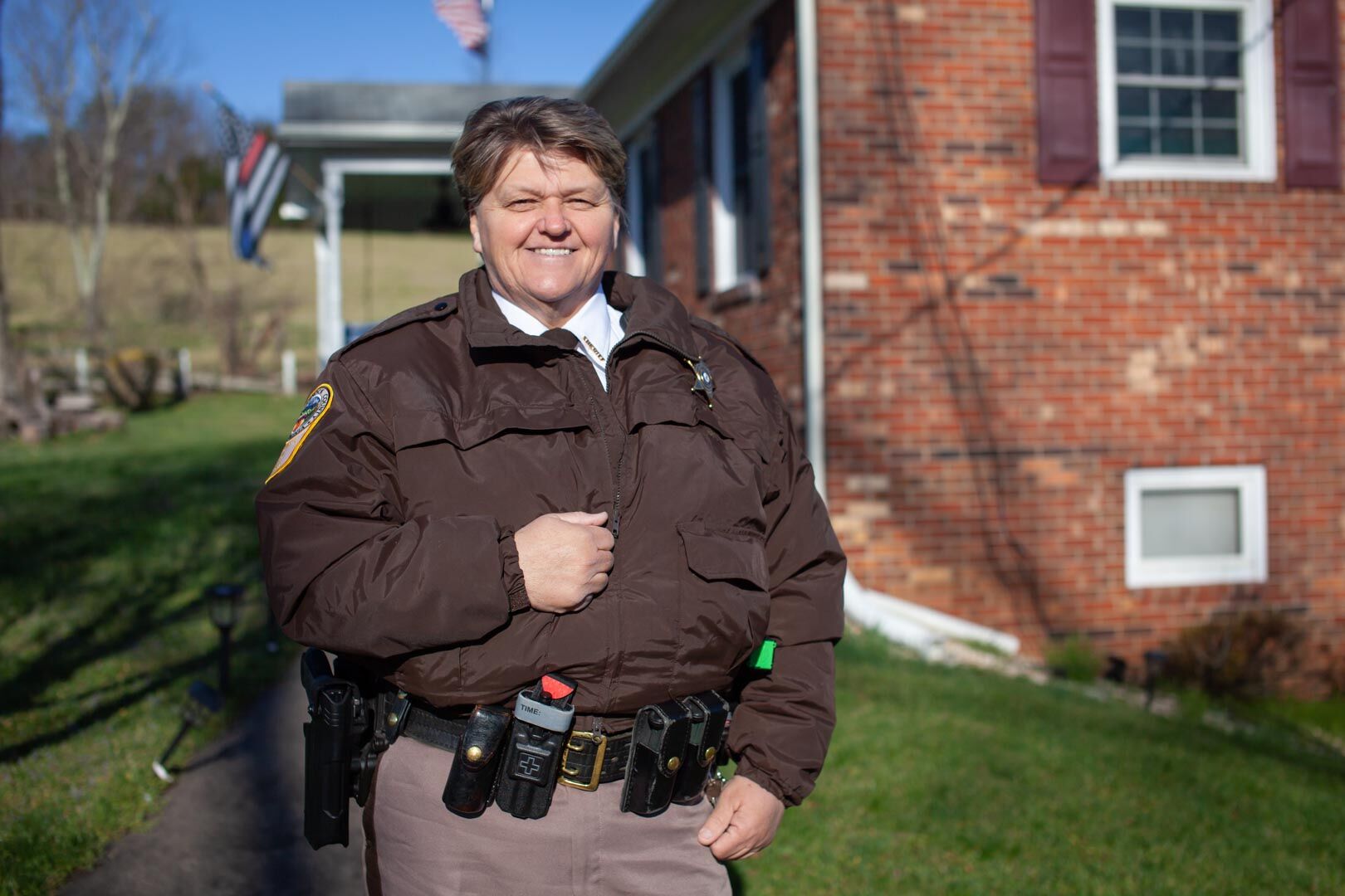 Compton recalled a song by Miranda Lambert, “The House That Built Me,” in front of a house feet away from her childhood home.