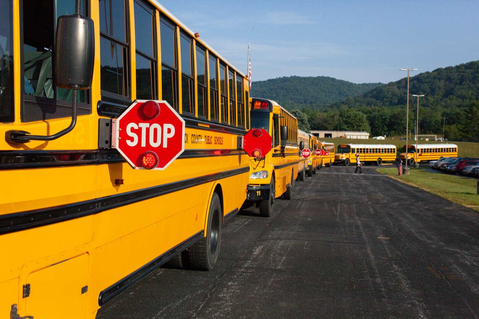 School busses ready to depart from the elementary school on the first day of the 2021-22 school year.