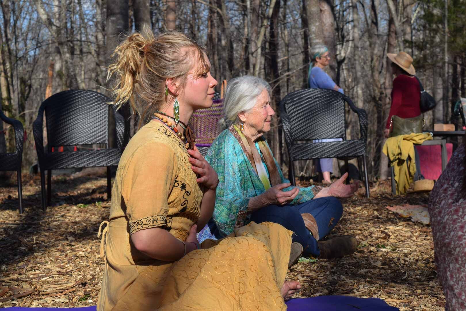 Molly Swartwout, 23, participates in yoga and meditation at the Red Tent event on Saturday. Swartwout was formerly a student at the Green Comfort School of Herbal Medicine.