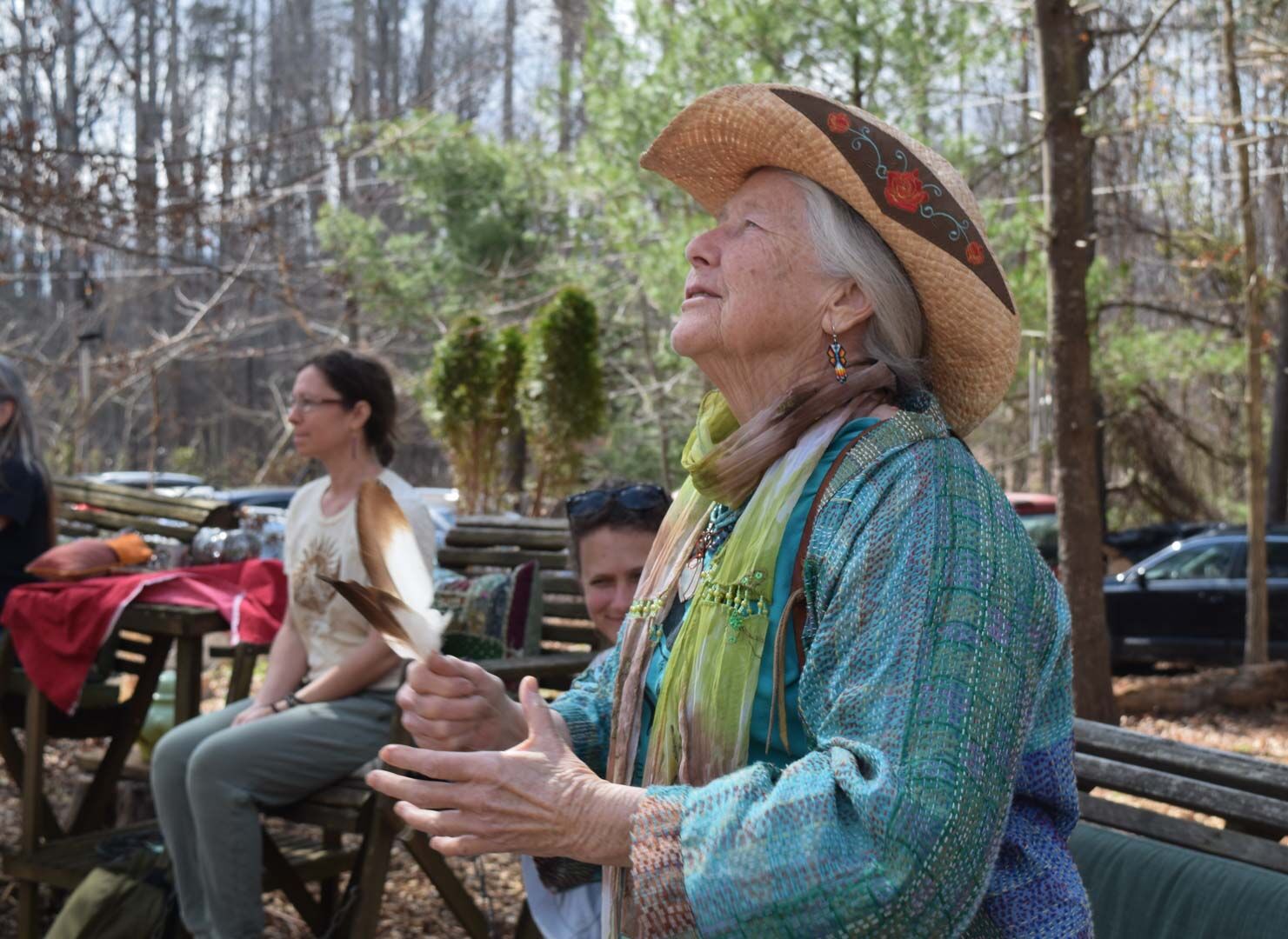 Cathy Kiley Martin leads the opening ceremony for the Rappahannock Red Tent Sisterhood event. Martin, a student of indigenous culture, performed songs from the Lakota and Cherokee tribes.