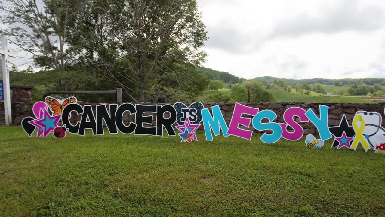 A look at the “Cancer is Messy” event, organized to honor cancer survivors and their families, including two young students at the county’s elementary school, Anne Genho and Farrah Gates.