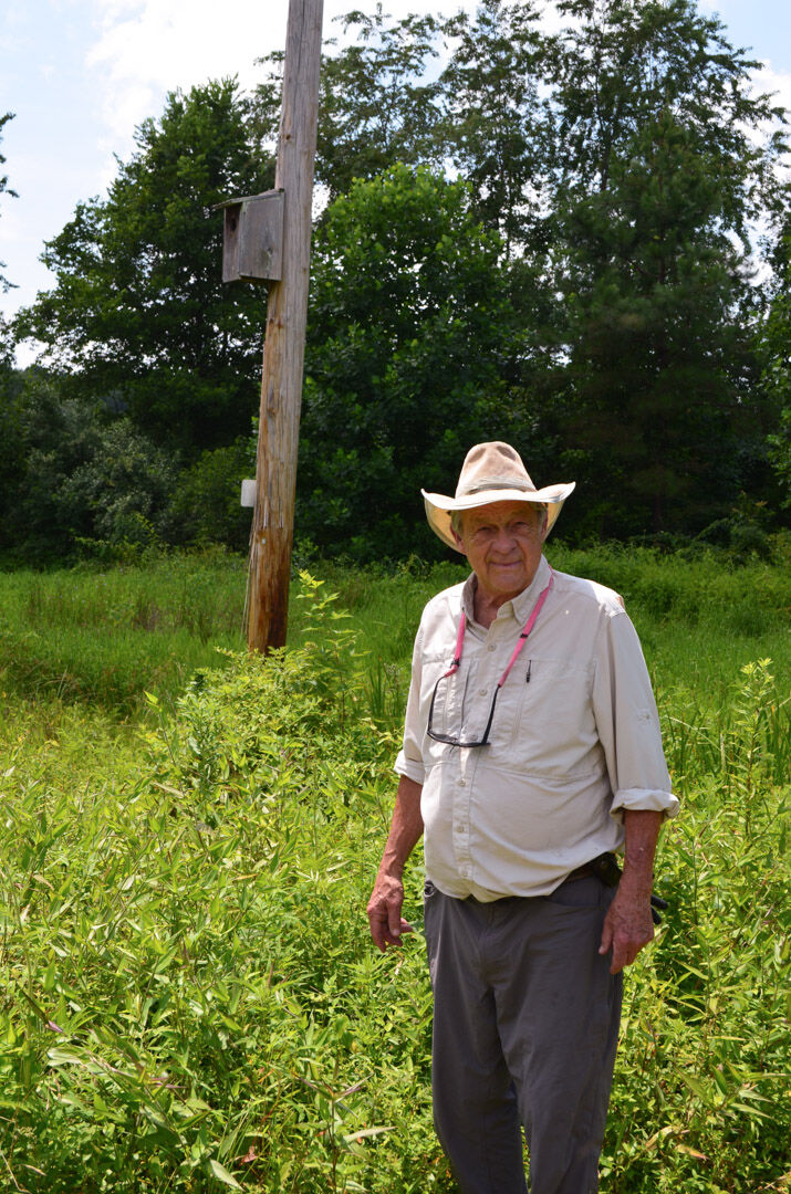 Bruce Jones with a Kestrel box he hosts.
