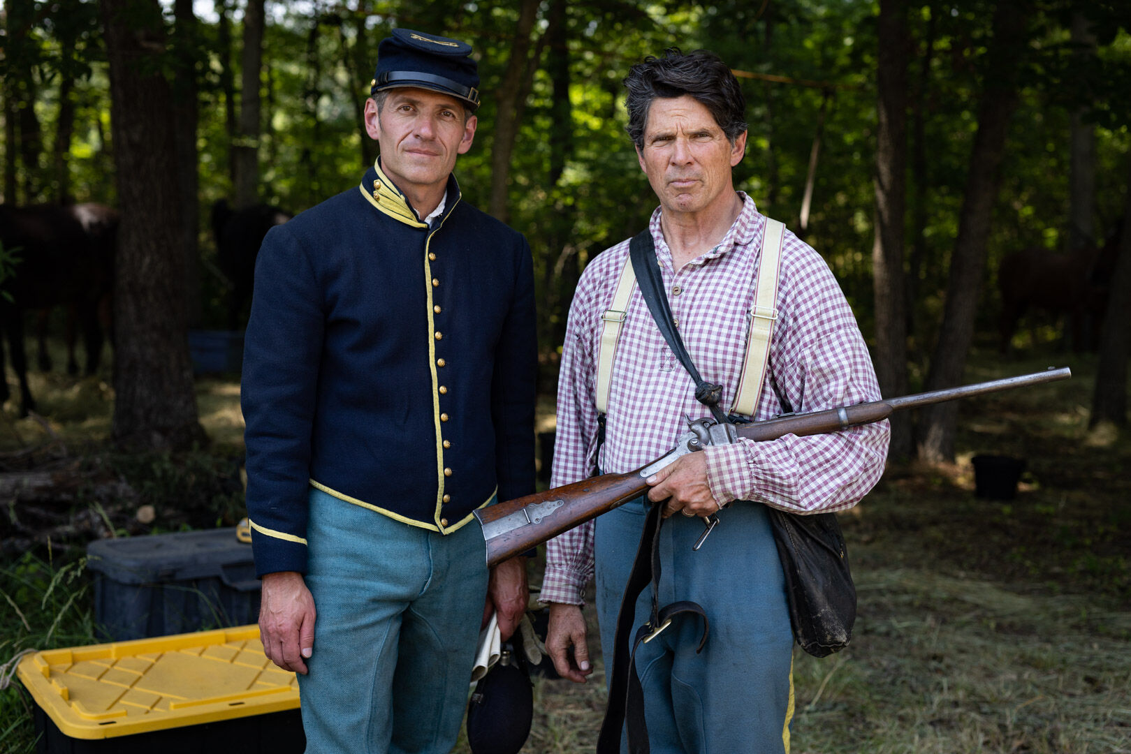 Dan Burtz of Colorado and Al Underwood of Barboursville, Va., rest in the Federal camp after the earlier battle and prepare for the Fight of Fleetwood Hill.