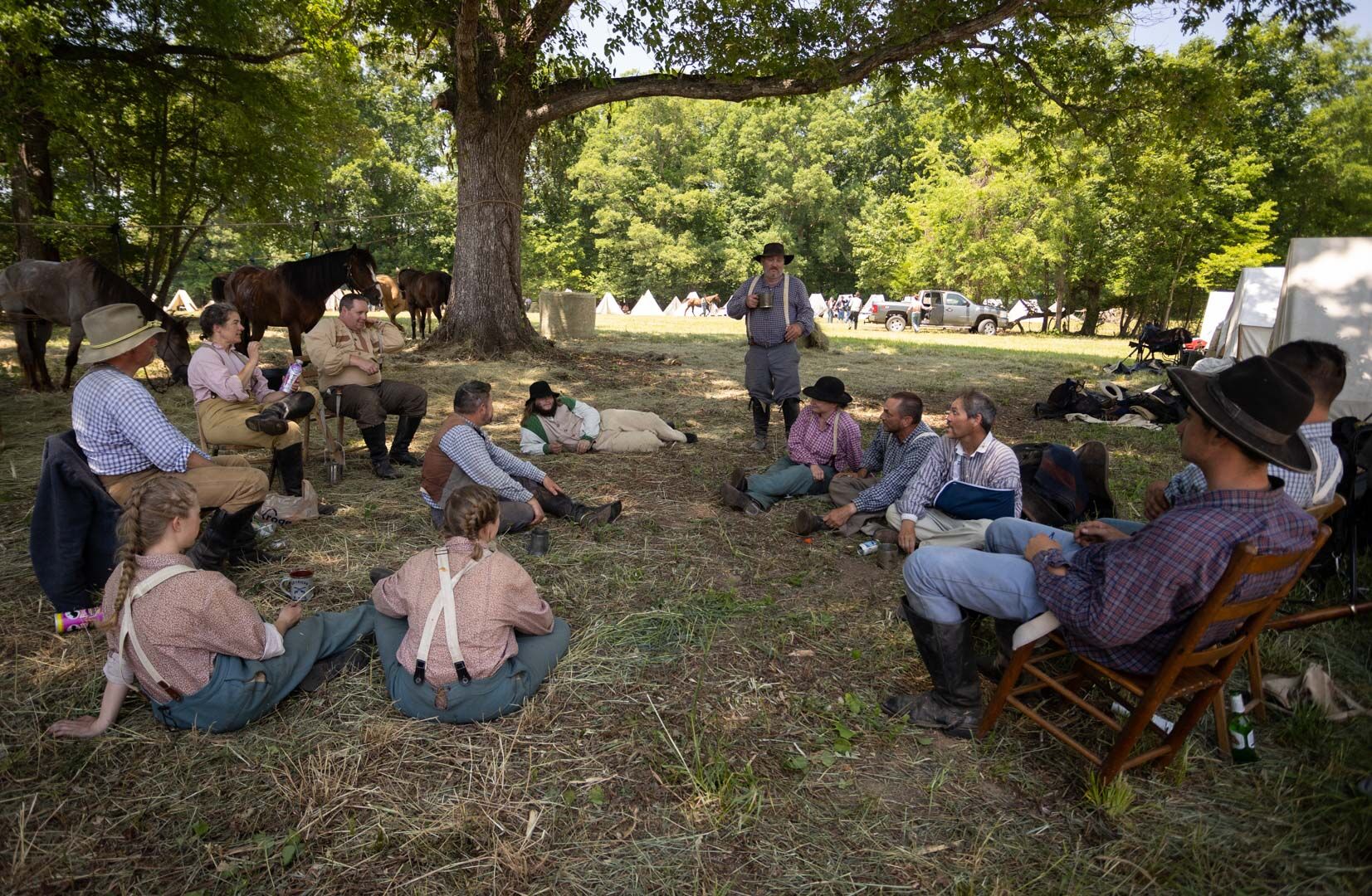 Members of the 5th Georgia Cavalry Division exchange stories from previous battles.