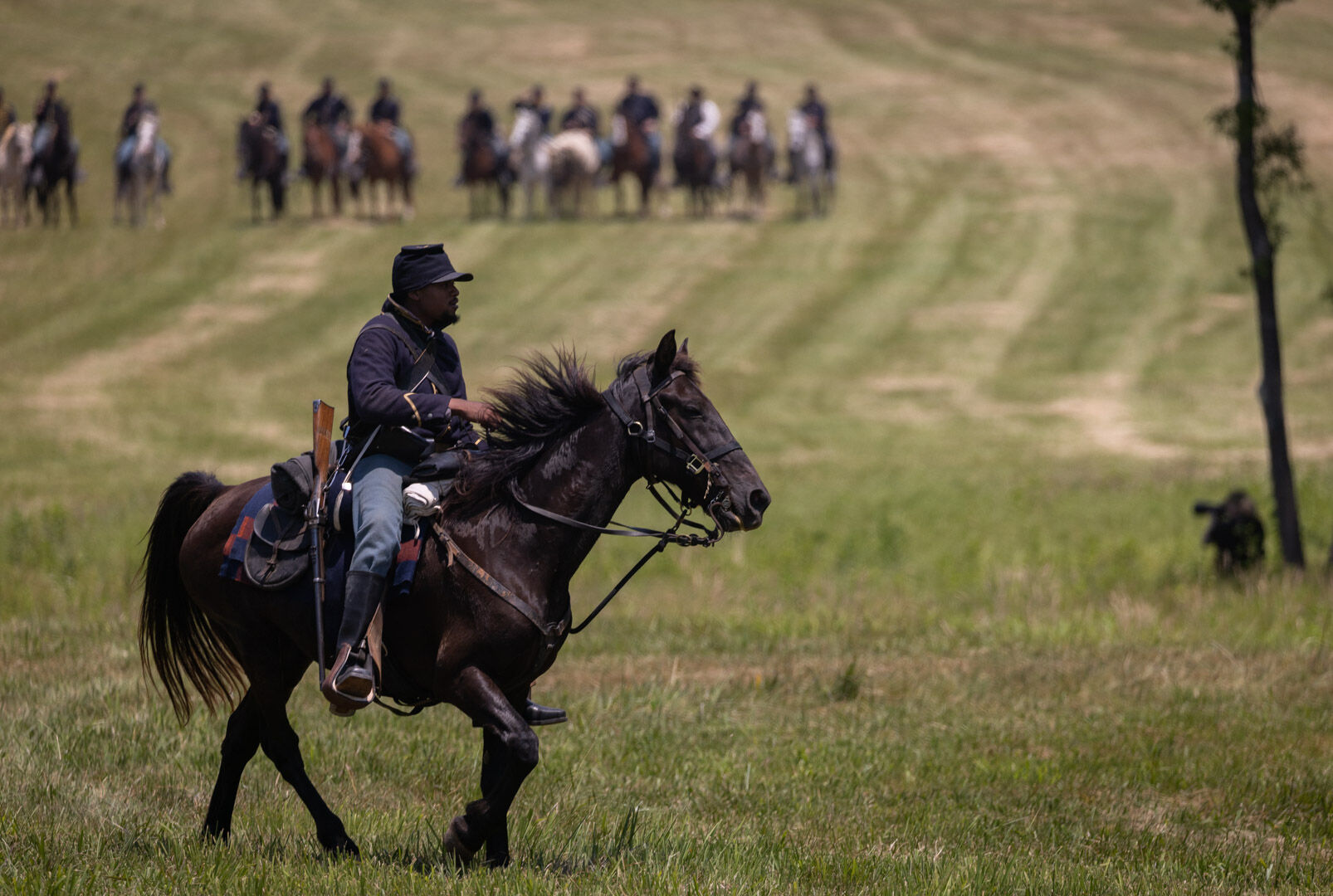 A lone Federal cavalryman rides to reengage his side at the Charging of the Confederate Guns at St. James Church on Saturday, June 10, 2023.
