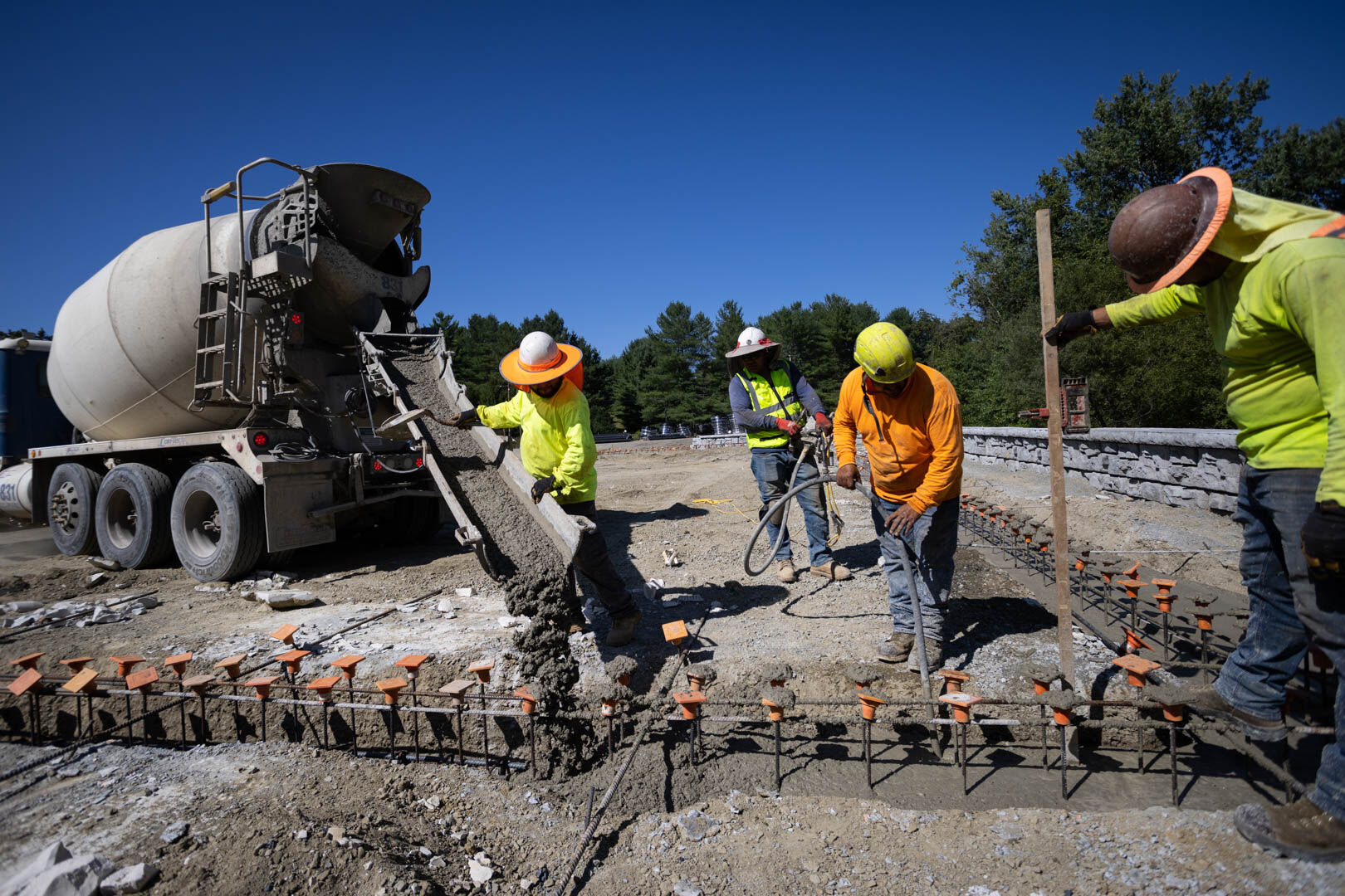 Pouring cement for the Food Pantry foundation at Rush River Commons earlier this month.