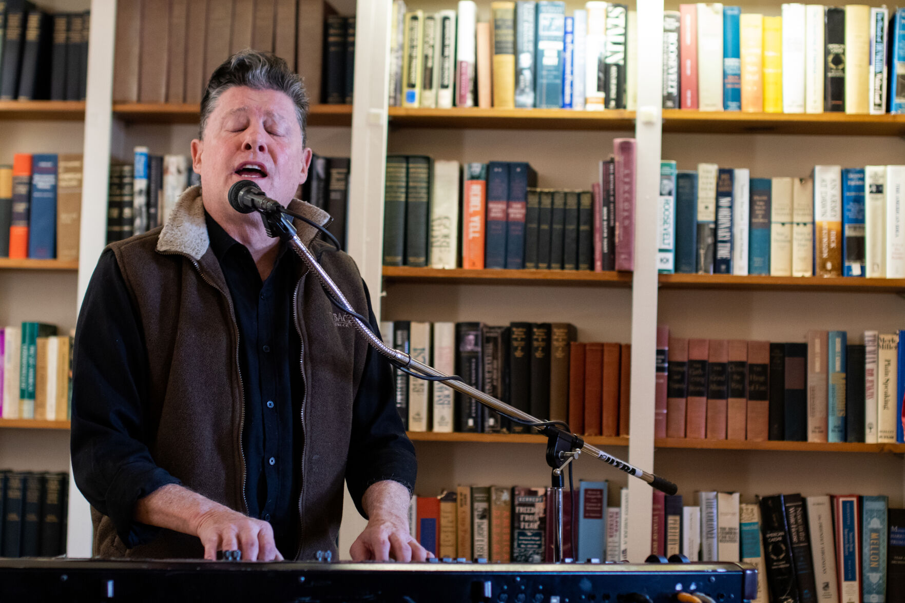 Ben Mason, musician and Rappahannock County resident, performs an original song at the Rappahannock Historical Society's program on Native American History.