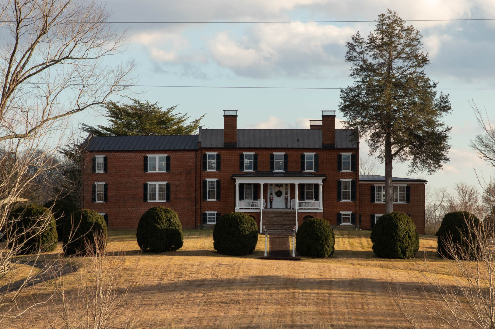 John Anderson's 16-year restoration project, Jessamine Hill, built between 1825 and 1830, was the home of Thomas Fletcher and his wife, Susan Stack Fletcher. Fate may have intended it to be Anderson's one day. When he was clearing the Fletcher family graveyard, he found the headstone of John Kinsey Fletcher, his namesake, and it's where he is to be buried, right behind the first John Kinsey. And the ashes of Anderson's first dog, Einstein,  will be buried with him.