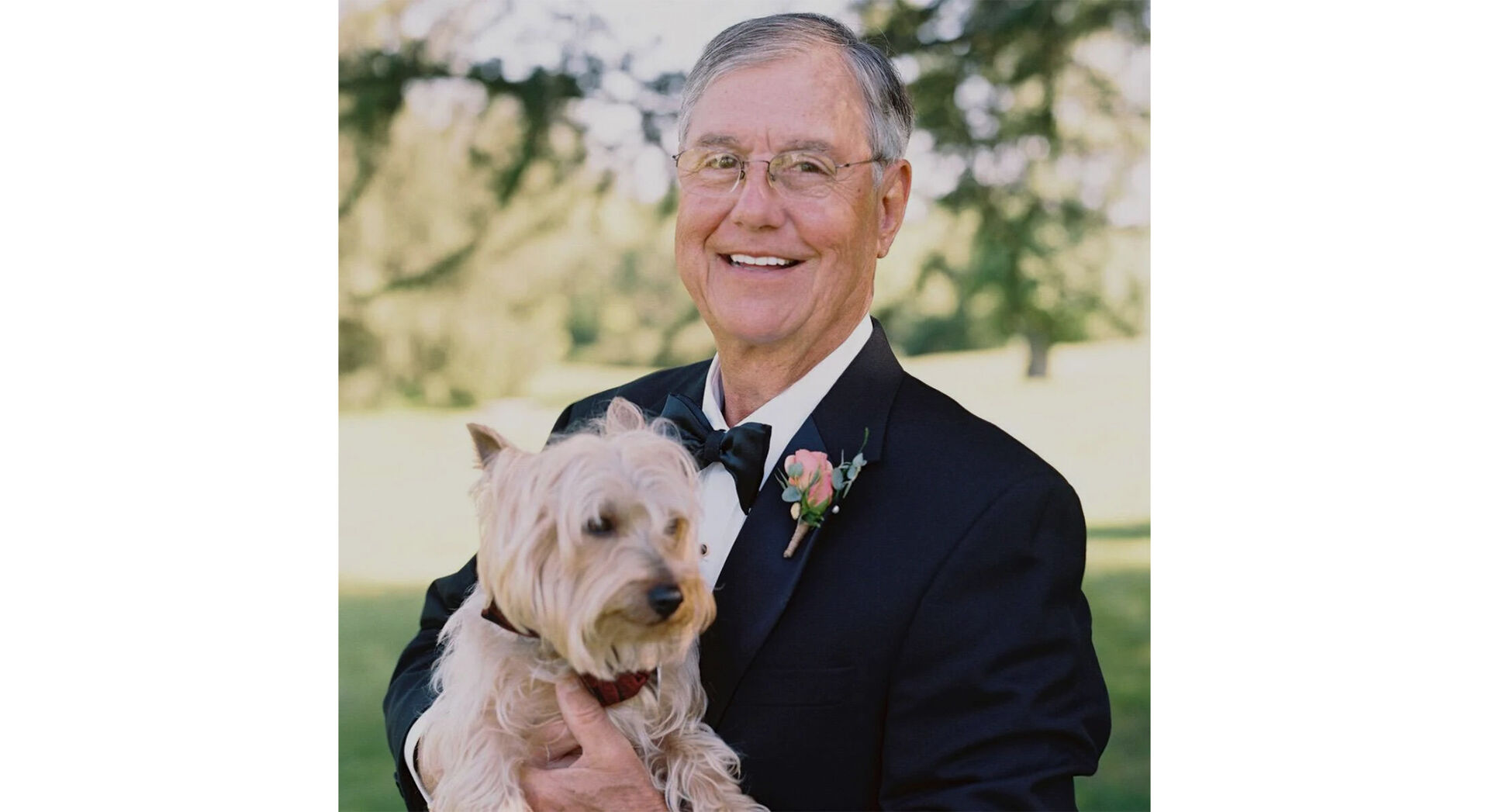 John Anderson with his first pup, Einstein, a Silky Terrier, at a wedding of one of his daughters at Jessamine Hill.