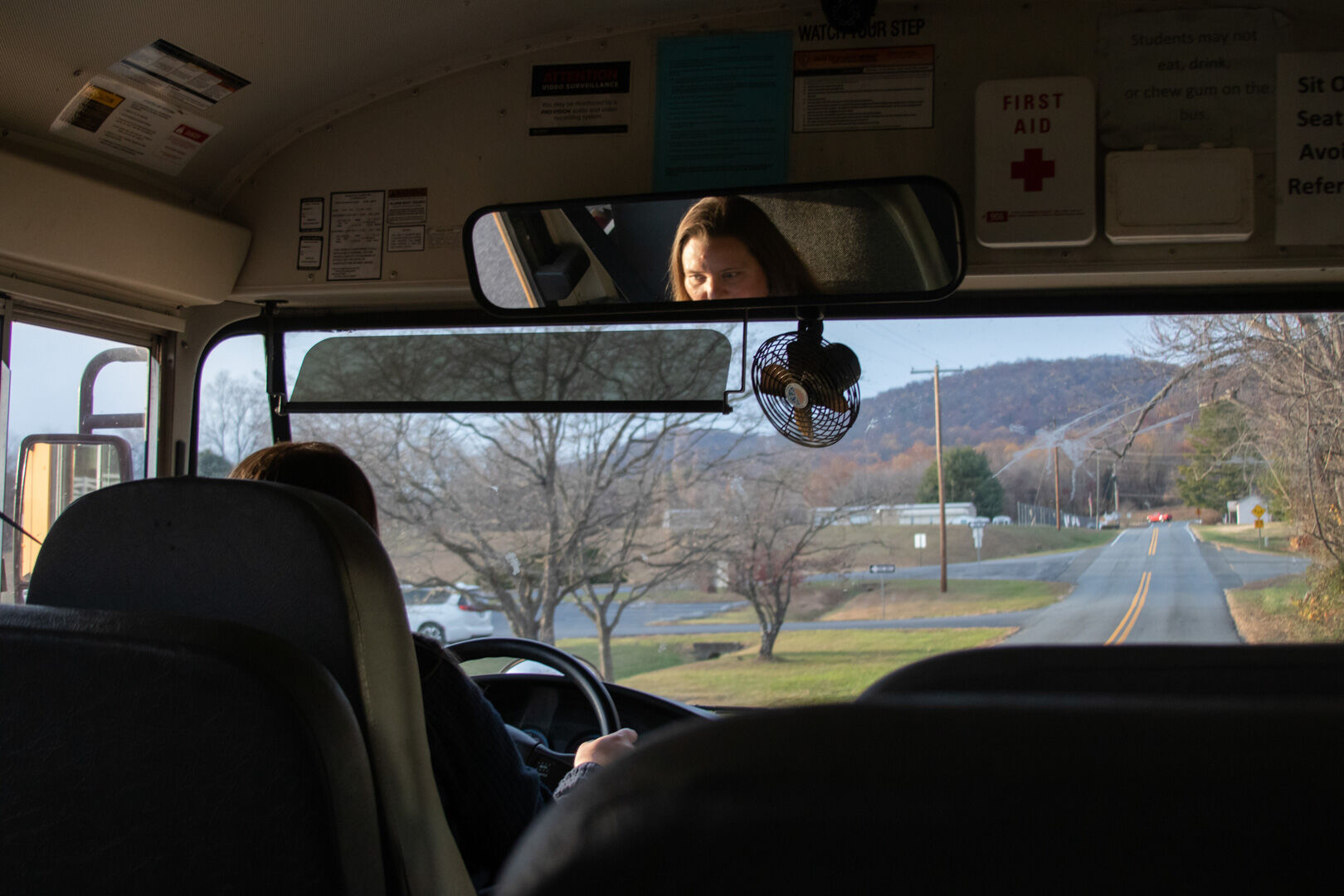 Grimsley driving a school bus down School House Road in Washington.