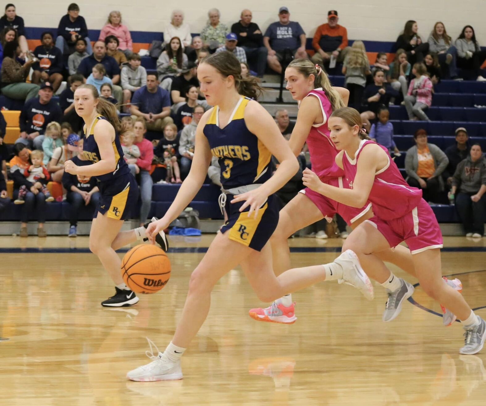 Chloe Jenkins (3), sophomore at RCHS, travels down the court with the ball in a game against the Clarke County Eagles on Jan. 26. The Panthers won the game 43-41.