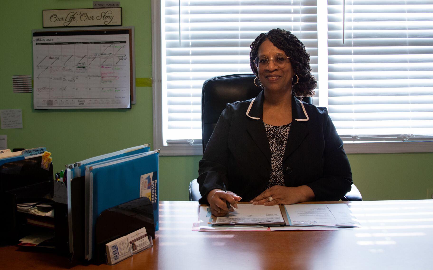 Felicia Champion, program director at Community Touch, an organization that helps residents who are experiencing homelessness or are low income secure housing.