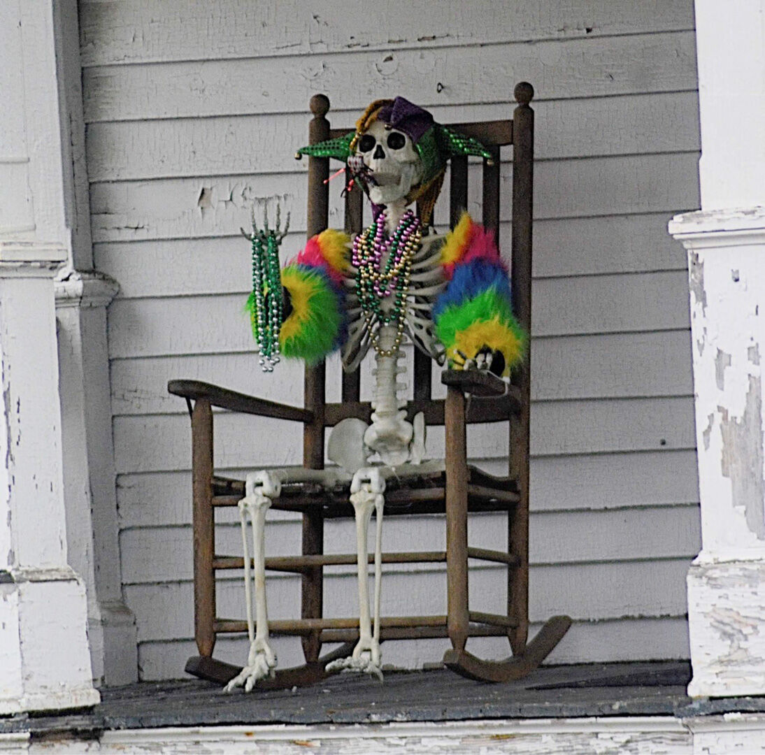 Dressed up for Mardi Gras on Andrea Herrell's porch.