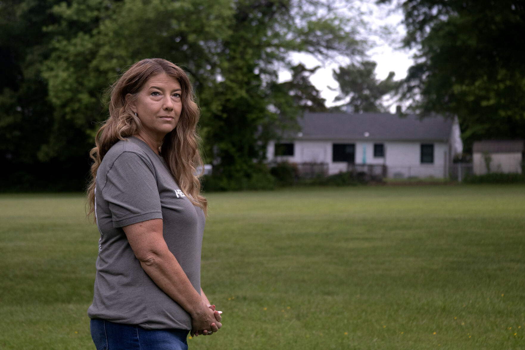Molly Brooks, founder and CEO of Hero's Bridge, at the future site of the Hero's Bridge Village, a proposed affordable housing community for senior veterans. The project has received some criticism from members of the community whose property butts up to the proposed location near the Warrenton United Methodist Church, which offered the land and is collaborating with Hero's Bridge on the project.