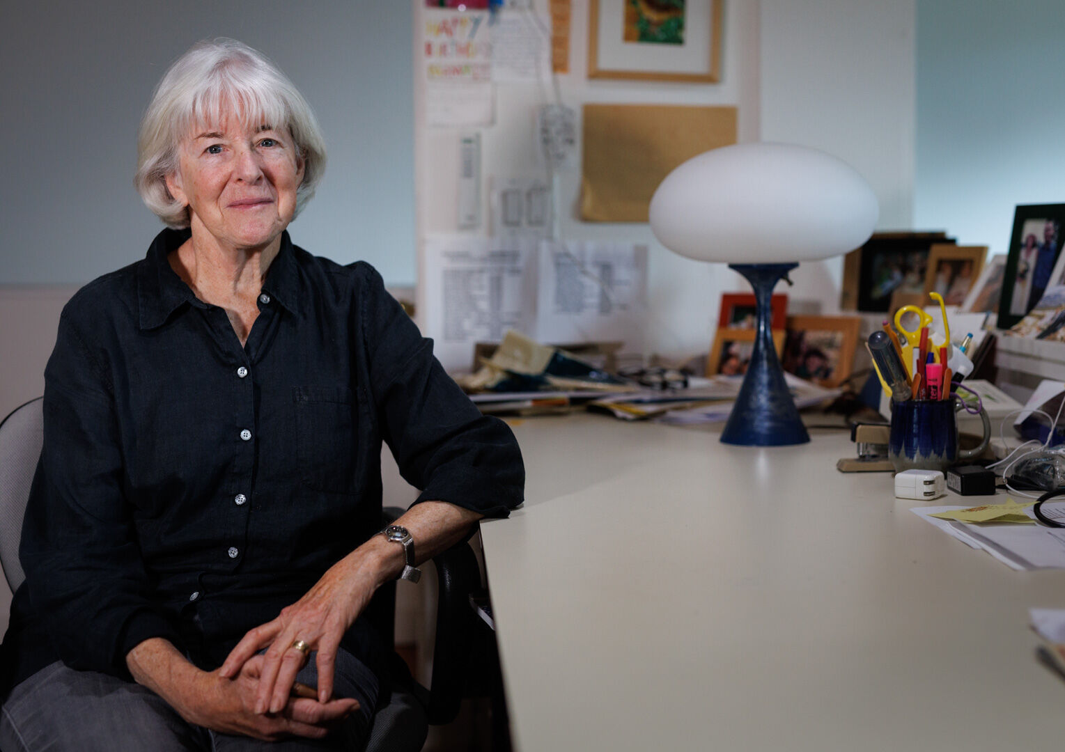 Edie Tatel at her desk where she helps David during the writing process.