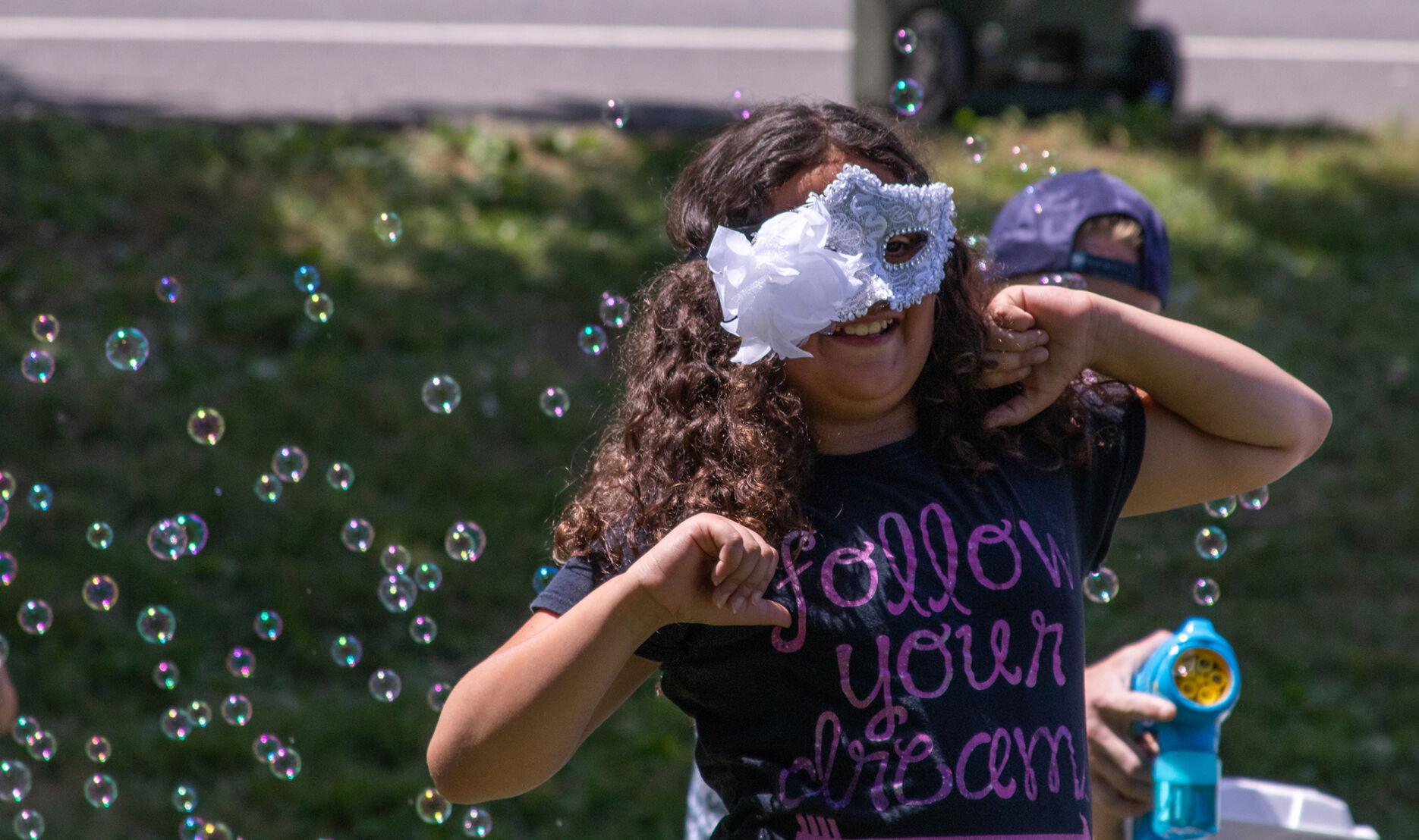 A young masked dancer.