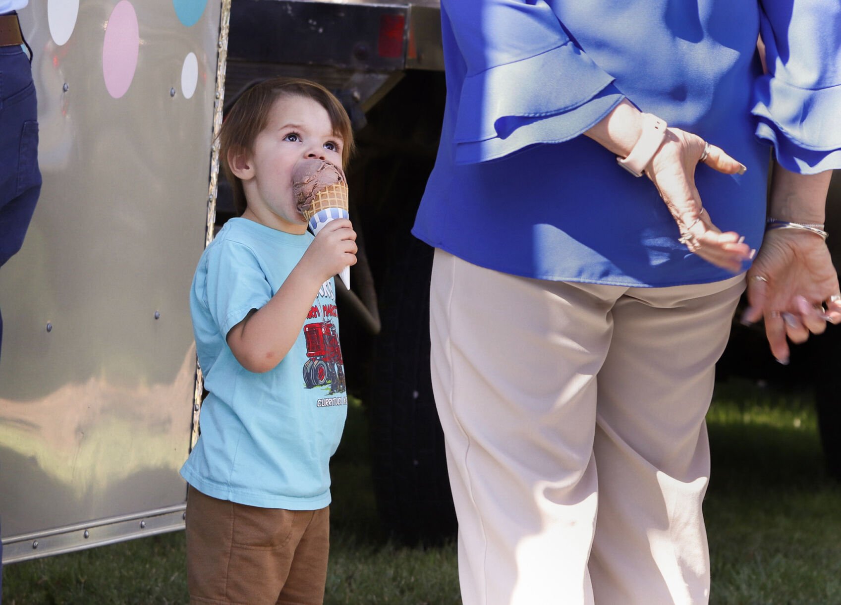 Buxton Hahn takes a big bite of his ice cream cone.