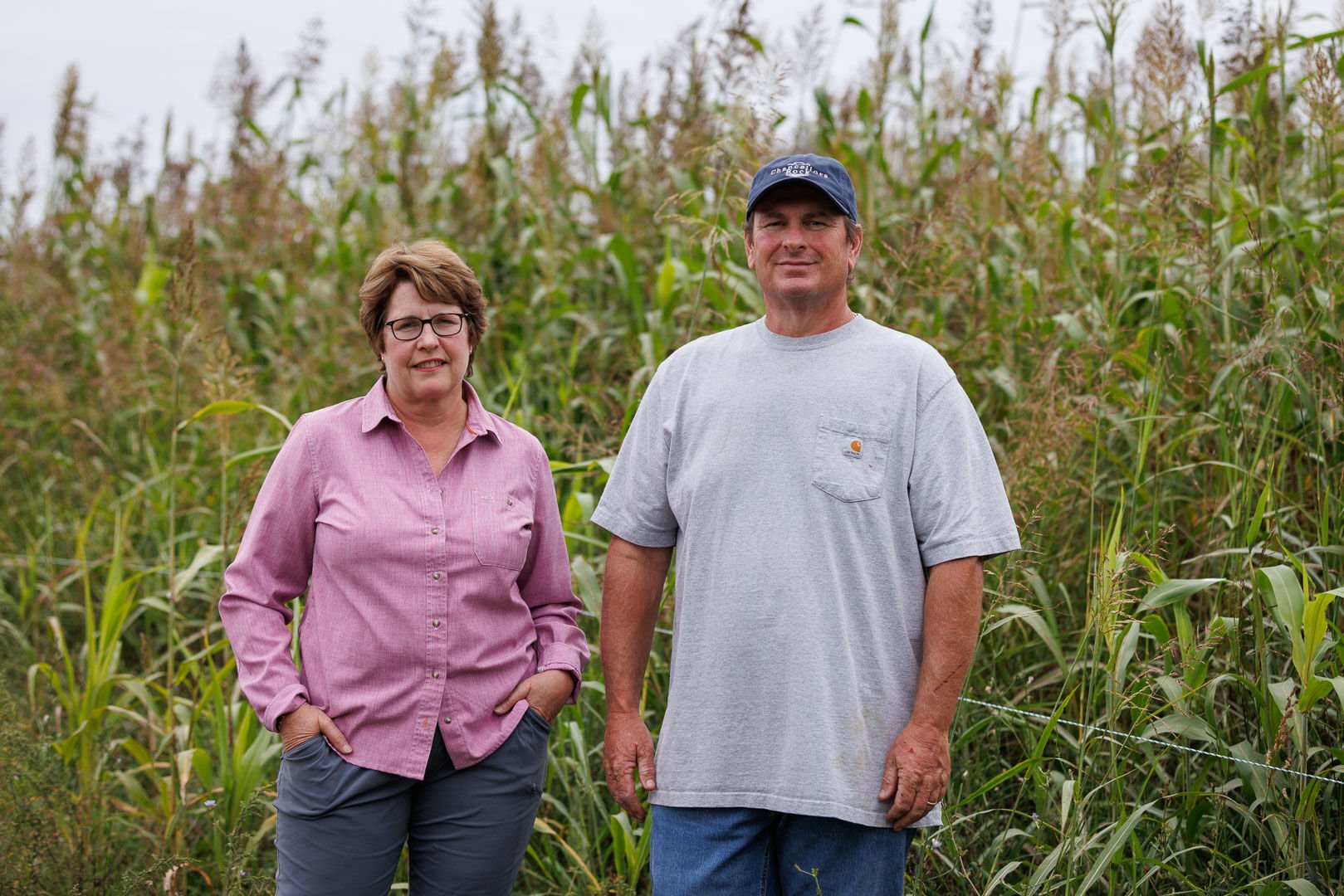 Chancellors Rock Farms owner Kathryn Everett and manager Chuck Presgraves in front of drought resistant “warm weather” annual grasses like sudan grass.