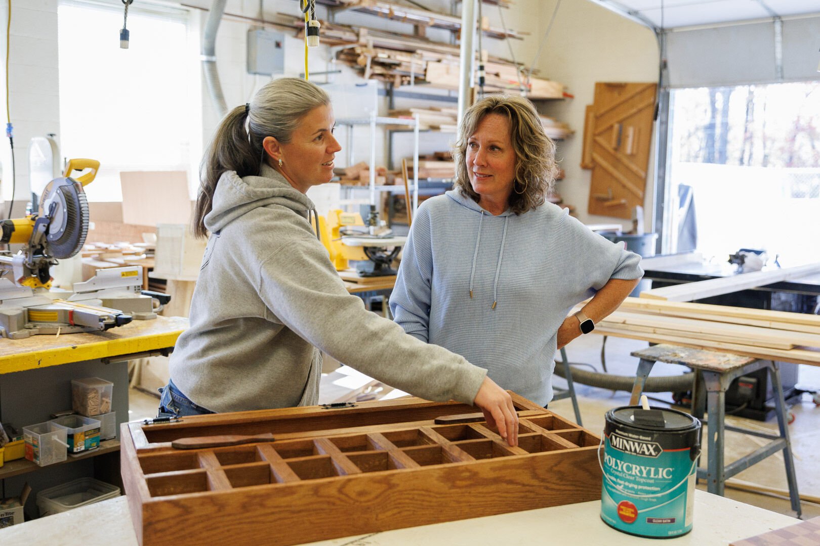 Kristina Farnham, Building Trades and Engineering Technology instructor and Jenny Kapsa who works on the Profile of a Graduate team at RCHS at a trade class.